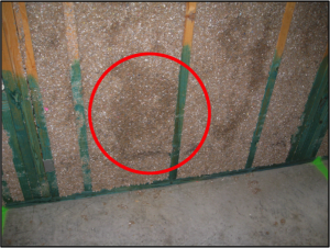 Wet-applied insulation that is still drying.