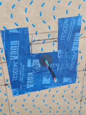 Right - Wiring penetration through exterior wall is flashed with tape.