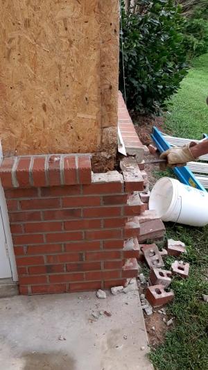 Wrong - Lack of house wrap or weather resistant barrier lead to significant water damage behind the brick veneer.