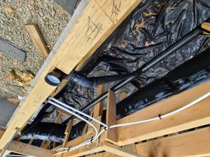 Wrong – It is not good practice to route plumbing through sill plates or on an exterior wall.