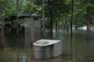 Wrong – The HVAC compressor was not adequately secured to an elevated platform and was washed away. 