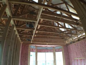 The OSB roof decking product comes with an adhered radiant foil barrier which helps to prevent heat transfer in or out of the vented attic, while R-13 unfaced fiberglass fills the advanced-framed 2x6 walls.