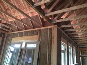 Baffles will keep insulation out of the soffit vents and wind out of the insulation in this vented attic.