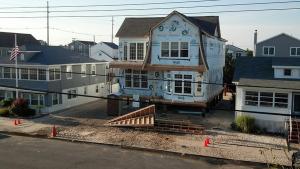 The pier foundation that lifts this home above flood waters is visible in this photo taken before the skirt walls were added.