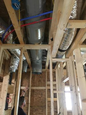 All of the ductwork for the efficient (8.5 HSPF, 15 SEER) heat pump is mastic sealed and installed in conditioned space.