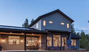 Awnings, overhangs, and porches shield windows and doors from sun, rain, and snow in this sunny mountain locale.