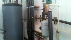 Pipe insulation helps retain heat in the pipes which provide hot water from the air-to-water heat pump for domestic hot water and space heating.