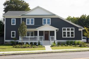The asymmetrical design of this home offers a large uninterrupted south-facing roof plane for solar photovoltaic and solar thermal panels. 