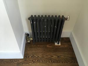 An air vent mounted high on the radiator will shut quickly and limit the radiator’s heat output