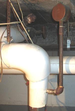 A main vent is installed on the side of a drip leg