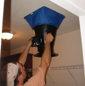 Measure the air flow of an exhaust fan with a flow hood