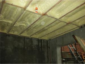 Right - The ceiling above the garage is air-sealed and insulated with spray foam.