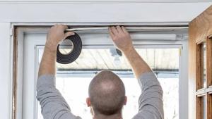 Weatherstrip installation on a door.