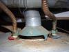 Look for signs of a gas water heater backdrafting (allowing combustion exhaust to spill back into the house instead of going up the flue).