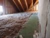 Right - R-100 of blown cellulose covers the floor and rafters of this attic.