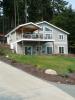 Clifton View Homes built this custom home in the marine climate in Coupeville, WA, and certified it to DOE Zero Energy Ready Home specifications in 2015. 