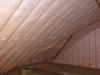 This attic was insulated with 5 inches of closed-cell spray foam on the underside of the roof deck plus 6.5 inches of blown fiberglass covered with sheetrock as a firebreak for a total R-58 roof assembly insulation value.