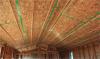The builder installed this OSB under the roof rafters and air sealed the seams with tape then added a dropped drywall ceiling to provide a service cavity for ducts and wiring, while minimizing holes into the attic.
