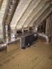 Right - Open-cell polyurethane spray foam to R-28 on underside of roof turns new attic into conditioned space for HVAC. 
