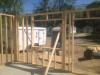 Headers over windows on non-load-bearing walls are open to allow room for insulation.