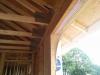 Rigid foam is sandwiched between lumber to form insulated headers over windows. 
