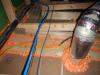 Spray foam air seals gaps around holes and drywall-to-top plate seams.
