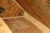Right - Spray foam insulates the attic eave between the attic floor and the SIP roof panel.