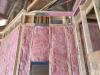 This unfaced fiberglass completely fills the wall cavities, with RESNET Grade 1 insulation. 