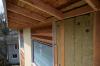 Rigid mineral wool insulation is covered with ¼-inch wood battens which provides a air and drainage gap under the cedar and fiber cement siding.