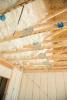The attic is insulated along the underside of the roof deck with 8 inches of open-cell spray foam.
