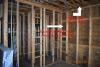 Advanced framing techniques including 2x6 walls spaced at 24 inches on center and ladder blocking at wall intersections allow more space for insulation in the wall cavities while open-web floor joists provide space between floors for ducting.