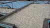 Spray foam and rigid foam were used under the slab while rigid foam wraps the exterior of the foundation walls.