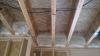 Rim joists are insulated with R-20 of open-cell spray foam which is air sealing and insulating but vapor permeable.