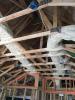 HVAC ducts can be encapsulated in 3 inches of closed-cell spray foam, then buried in R-49 of blown fiberglass insulation after the ceiling drywall is installed in the vented attic. 