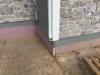 Rigid foam protects the exterior of the foundation.
