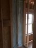 This builder installs spray foam in exterior wall cavities where tubs and showers will be installed to air seal and insulate the exterior wall. 