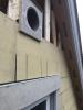 Right – A metal flashing was installed behind the first row of siding above the windows to guide water over the trim.