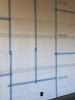 Right- The rigid foam sheathing is taped at all seams before installing the metal lathe for stucco cladding.