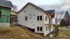 Right – A paint-on flashing was applied to the window frames of this ICF house before installing the windows.