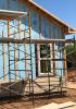 Right – Furring strips provide a drainage gap between the rigid foam and the siding.