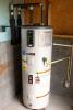 Right – The pipes on this heat pump water heater are carefully insulated.
