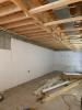 Right – A termite inspection gap is left at the top of the rigid foam board basement wall insulation.