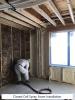 Right – Closed-cell spray foam seals the wall cavities.