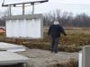 Right – Prepoured foundation panels with integrated insulation and vapor barrier are installed in place.