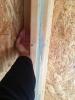 Right – This three studs in this corner are positioned to allow insulation against more of the exterior wall than standard three-stud corners.