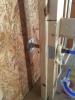 Right – Tape and spray foam are used to air seal around pipes that extend through exterior walls.