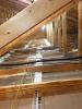 Right – The top plate-to-dry wall seams of the interior walls are sealed from the attic.