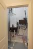Right – The home’s energy management system is installed in a utility closet next to the tankless water heater.