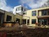 Right – Furring strips were installed to provide a 3/8-inch drainage plane over the rigid foam and under the fiber cement lap siding.
