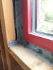 Right – Interior wood-to-wood seams around a window are sealed with tape to prevent air leakage. 
